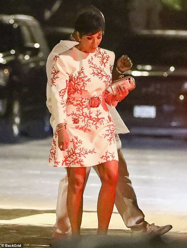 Shining bright: Jenner added a bit of extra glam to her look with a pair of high-heeled shoes and accessorized with numerous bracelets