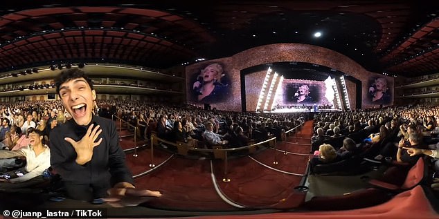 Moment: A defiant Adele superfan who was defended by the singer after standing up and filming himself during her concert - has revealed he's 'not really sorry' for disrupting other fans