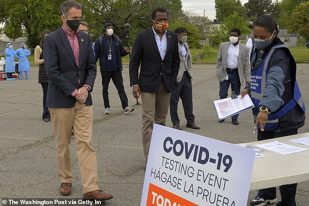 The positive case was detected in an asymptomatic patient in Virginia who was tested August 10 (Image of former Virginia Governor Ralph Northam, left, watching a Covid testing center being set up in 2020)