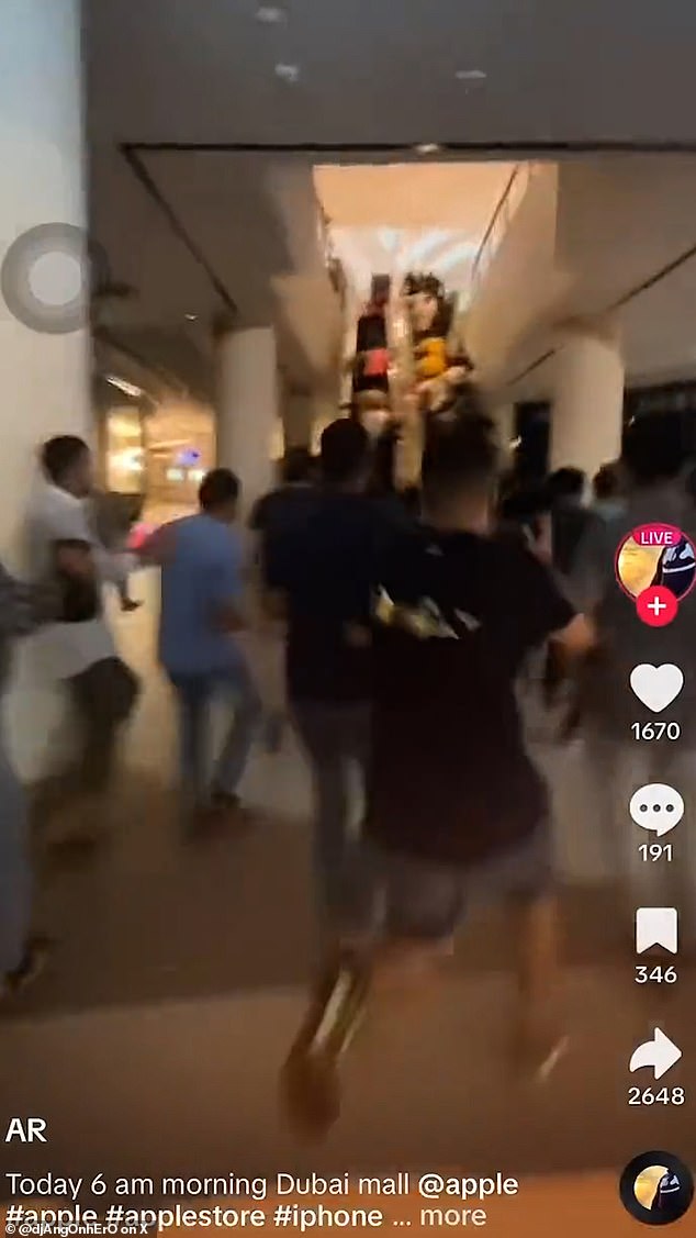 Videos also show customers running through the centre and piling onto escalators