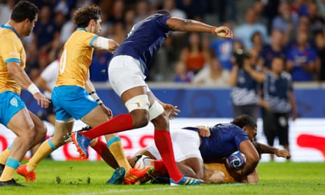 Peato Mauvaka scores a try for France.