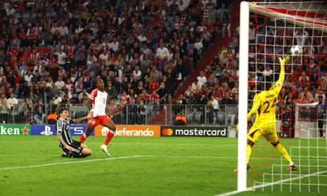 Mathys Tel of Bayern Munich scores a goal to make the score 4-2 against Manchester United.