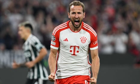 Harry Kane celebrates after scoring from the spot for Bayern’s third goal in their 4-3 victory over Manchester United.