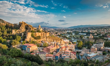 Aerial view, on a beautiful blue-sky afternoon of Georgia’s capital, Tbilisi.
