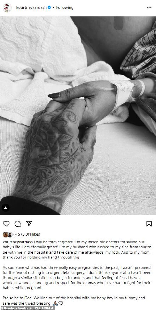 'I am eternally grateful to my husband': The 44-year-old reality star took to Instagram on Wednesday to share a black and white snap of she and her 47-year-old musician husband holding hands on a hospital bed