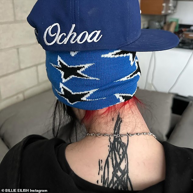 She previously teased the massive tattoo in September