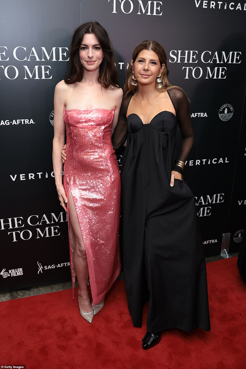 Simply stunning! Anne Hathaway and Marisa Tomei put on a style tour de force as they supported their upcoming romantic comedy She Came To Me in New York City on Tuesday evening