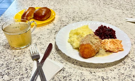 Chicken Kyiv, chicken broth, and buns.