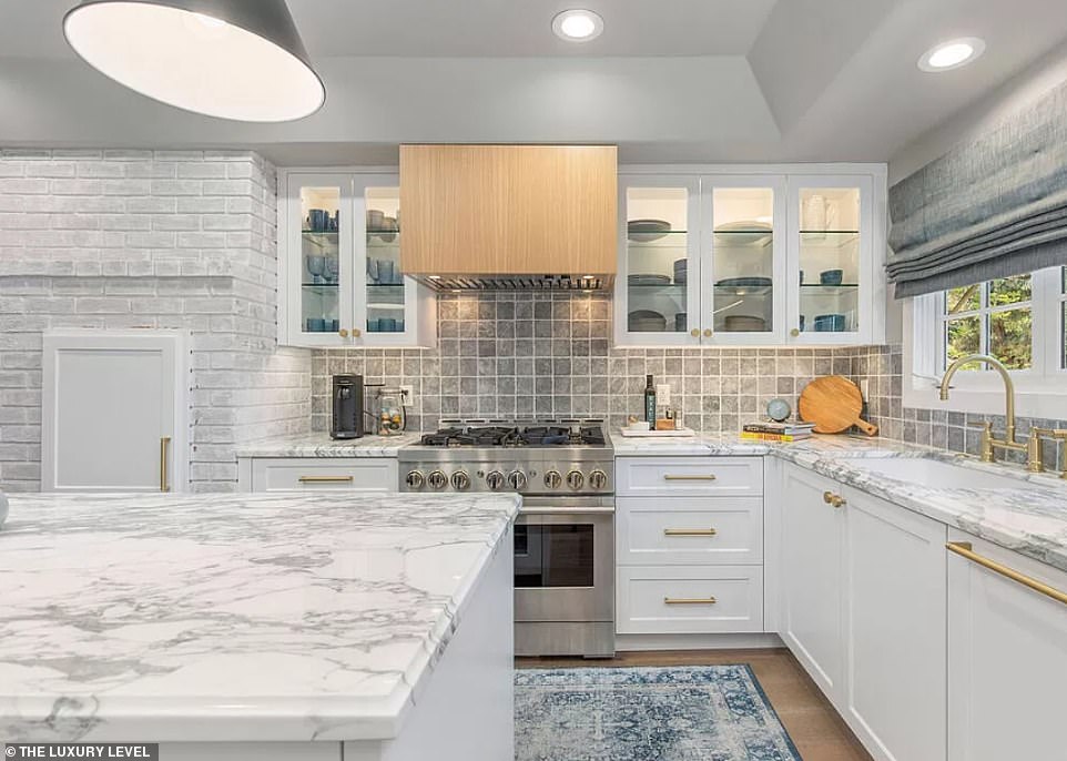 The kitchen is a chef's dream with all the latest amenities