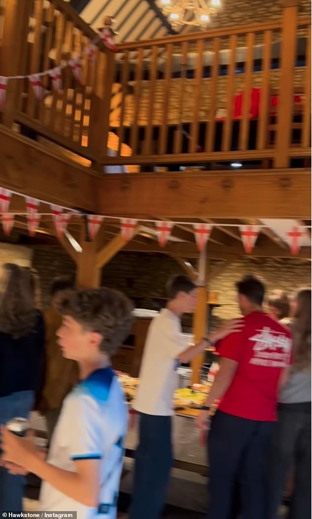 The boozer also features cobblestone walls, traditional beams and a mezzanine floor all decorated in dozens of England flags ahead of their loss against Spain