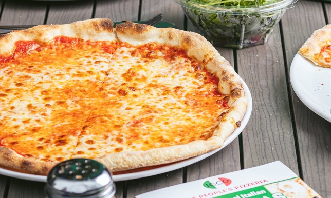 A cheesy margherita pizza from ICCO 