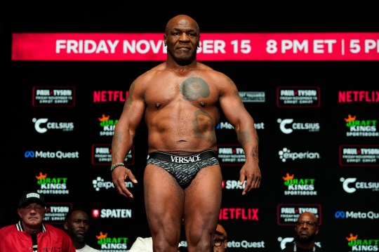 Former US heavyweight boxing champion Mike Tyson looks on during his weigh-in ahead of his heavyweight boxing match against US boxer and actor Jake Paul in Irving, Texas, on November 14, 2024