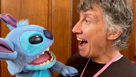 BBC A Stitch puppet in looks face to face with Richard North from Wow Stuff - both have a similar surprised expression