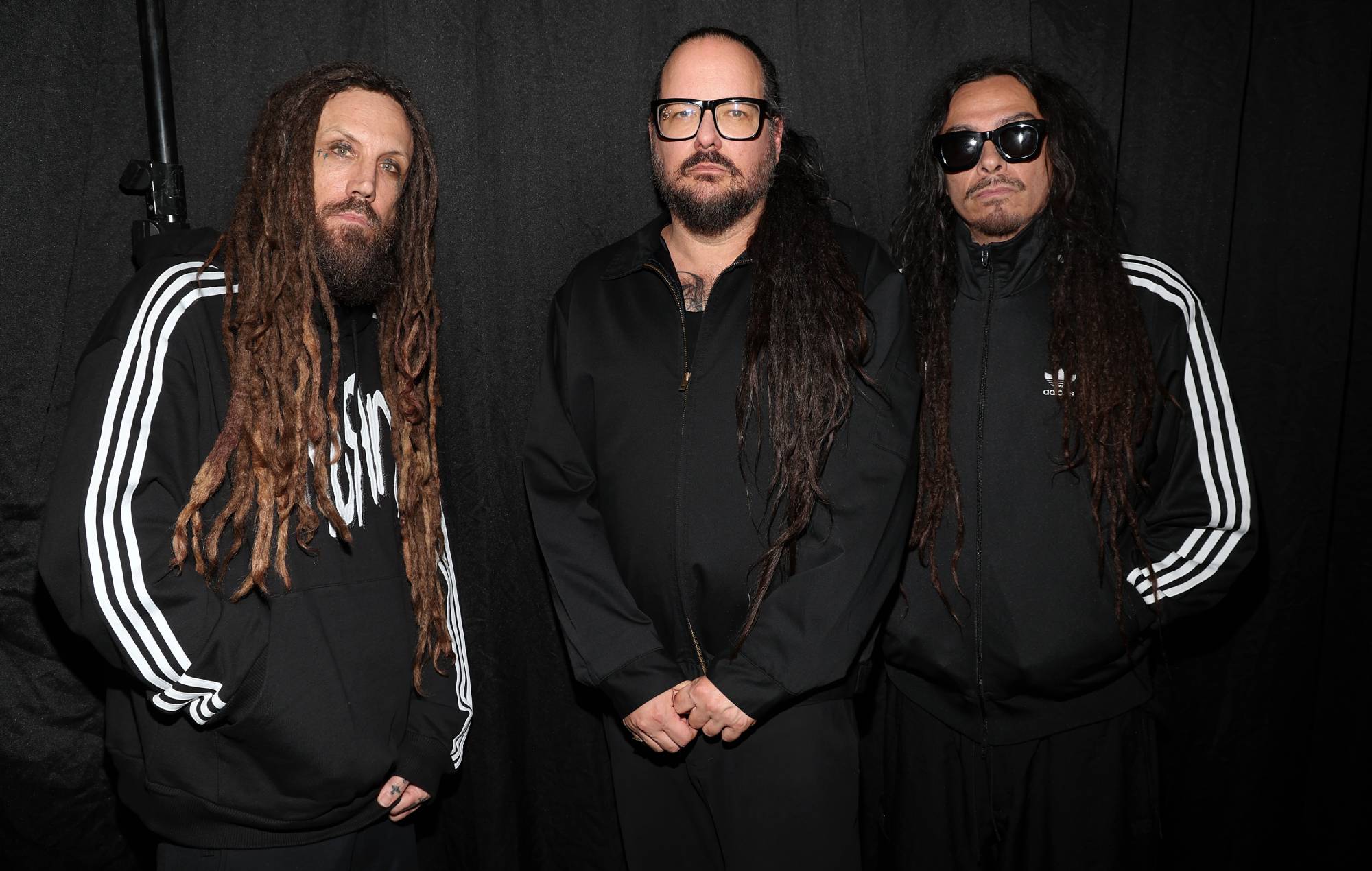 Brian Welch, Jonathan Davis and James Shaffer of KoRn