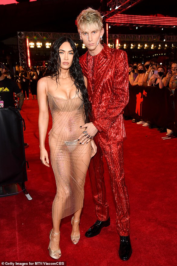 Whirlwind: Megan Fox and Machine Gun Kelly have become one of Hollywood's most talked about couples since going public with their PDA-packed relationship in early 2020. And with a wedding around the corner, DailyMail.com is taking a look back at the unlikely duo's whirlwind romance from their first meeting to MGK's surprise proposal; Megan and MGK pictured in September 2021