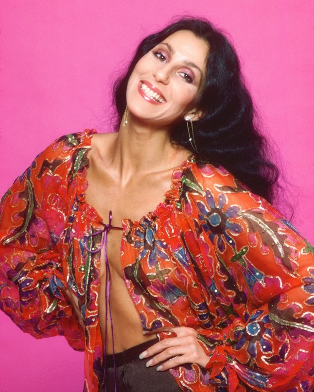 LOS ANGELES - MARCH 21: Singer and actress Cher poses for a photo session in a Bob Mackie blouse on March 21, 1977 in Los Angeles, California. (Photo by Harry Langdon/Getty Images)