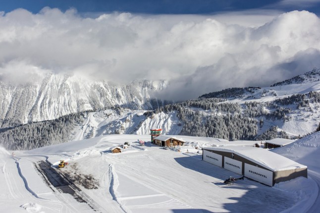 Clearing the runway of snow at Courchevel airport