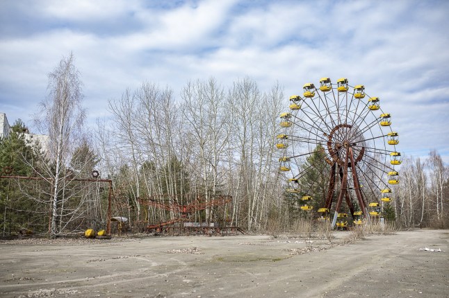 CHERNOBYL, UKRAINE - MARCH 17: A view from Chernobyl as Ukrainian soldiers visit the 30-kilometer exclusion zone surrounding the Chernobyl nuclear power plant and the town of Pripyat where thousands of people who once worked at the nuclear power plant live, in Chernobyl, Ukraine on March 17, 2024. The traces of the explosion at the Chernobyl Nuclear Power Plant, the scene of the world's biggest nuclear disaster, still bear the traces of the explosion 38 years later. Pripyat, which was established in 1970 for Chernobyl Nuclear Power Plant workers and abandoned after the disaster, resembles a ghost town. While the accident that took place on April 26, 1986 at the plant 110 kilometers away from Kyiv, remains in the memories, the consequences of the accident are still being discussed on the international agenda. (Photo by Gian Marco Benedetto/Anadolu via Getty Images)