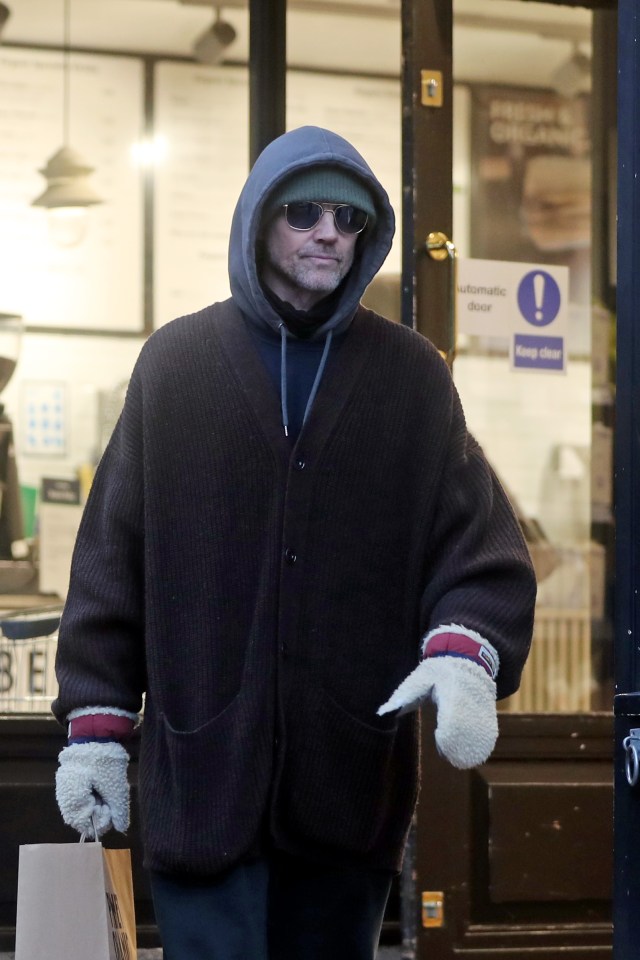 Jason Orange leaving a store in Hampstead.