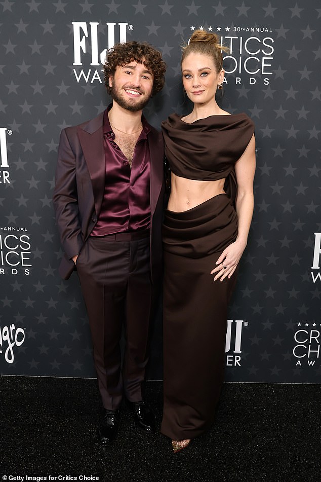 Saturday Night co-stars Gabriel LaBelle and Kimberly Matula on the red carpet; Kimberly showcased her incredible abs in a cut-out brown gown