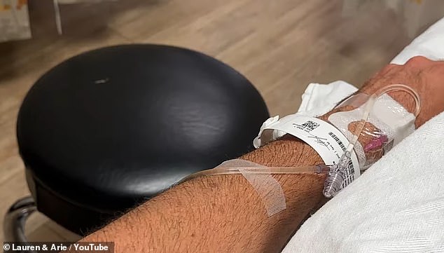 One picture highlights the IV in the reality star's arm in the hpospital
