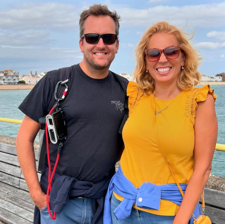 Jon Boast and Jasmine Harman posing on a pier