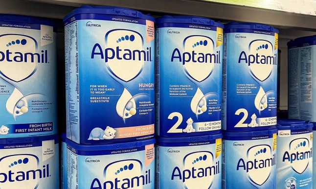 London, UK- April 28, 2022: Aptamil milk powder displayed on the shelves in a supermarket. Aptamil is a baby formula milk brand part of Danone. ; Shutterstock ID 2159525293; purchase_order: -; job: -; client: -; other: -