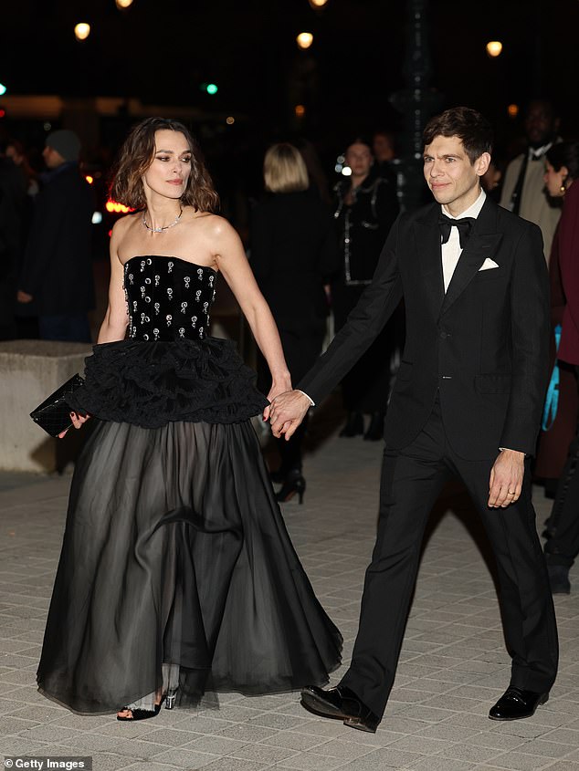 Keira arrived hand in hand with her musician husband James Righton. The Atonement star looked stunning in the dress, which featured an embellished velvet top and dramatic ruffle