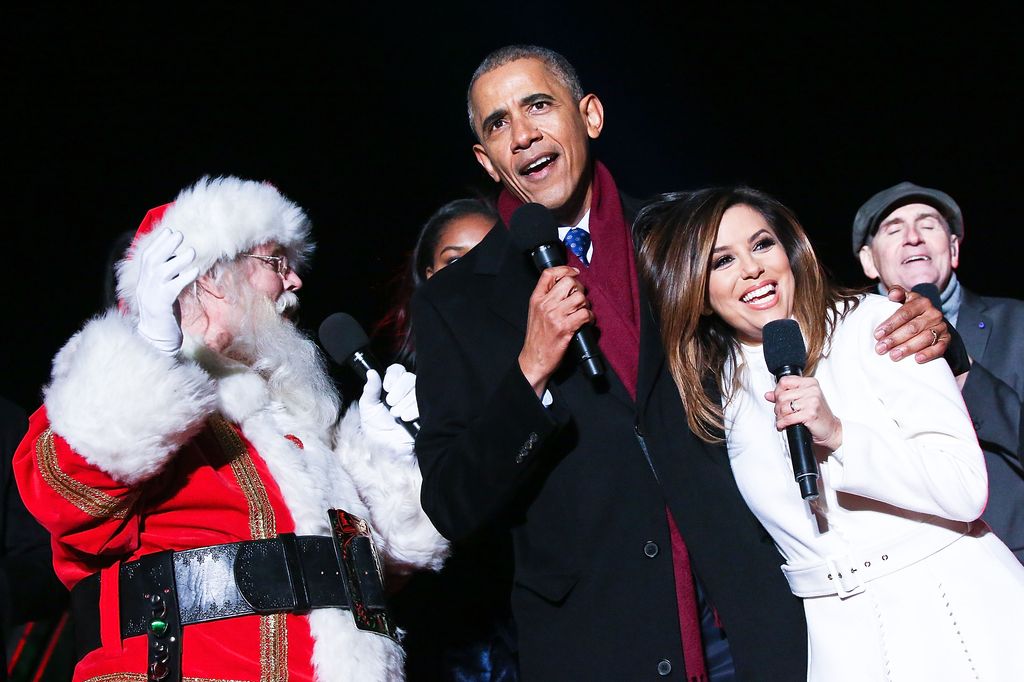 President Barack Obama sings "Jingle Bells" with Santa Claus, Eva Longoria and James Taylor during the 94th Annual National Christmas Tree Lighting Ceremony 