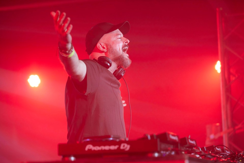 DJ Andi Durrant performing at a show.