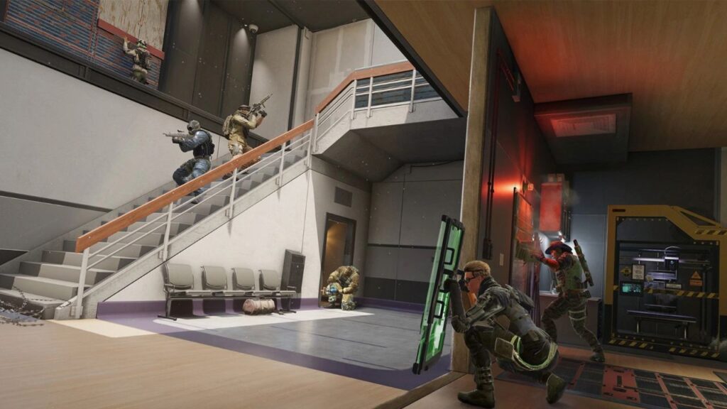 A tactical scene from the video game Siege X shows armed soldiers navigating an indoor setting with staircases and equipment, preparing for action.