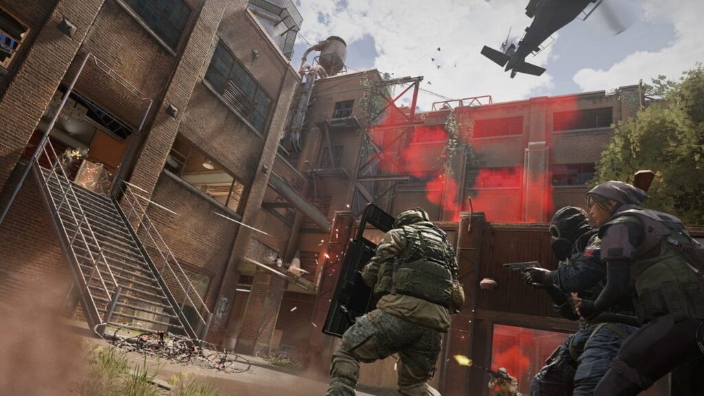 A tactical team from Siege X advanced through a gritty urban environment, with a helicopter overhead and explosions scattering debris around them.
