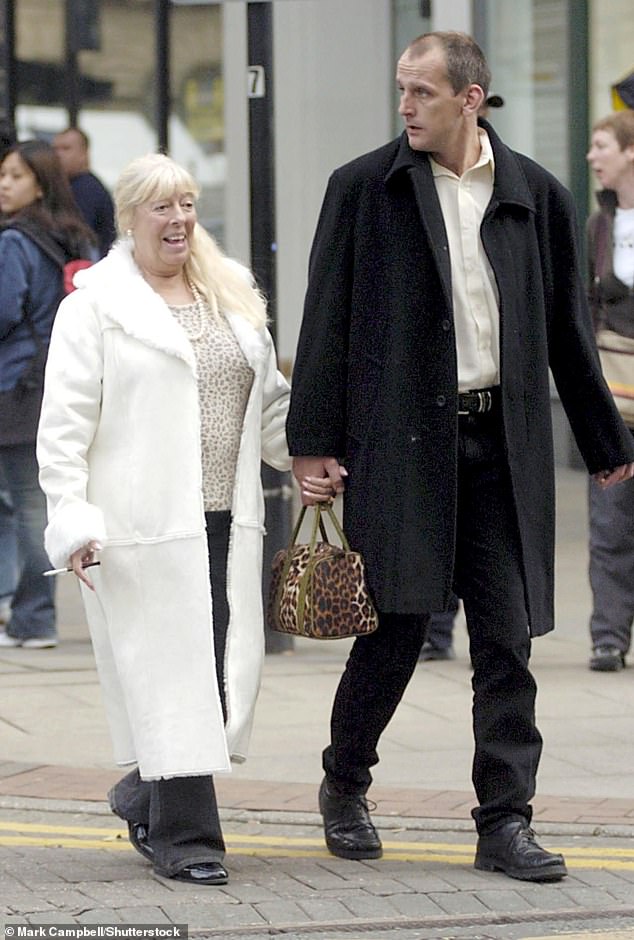 Julie first met Scott in 1996 when he delivered plaster to a house she was renovating. They tied the knot in 2007 after Scott proposed every day for 11 years (pictured together in 2004)