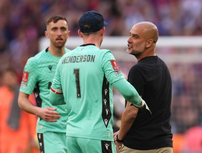 Soccer Football - FA Cup - Final - Crystal Palace v Manchester City - Wembley Stadium, London, Britain - May 17, 2025 Manchester City manager Pep Guardiola with Crystal Palace's Dean Henderson after Crystal Palace won the FA Cup REUTERS/David Klein