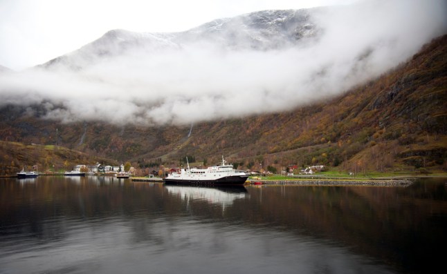 The small village of Fl??m, at the tip of the Aurlandsfjord, is visited by several hundred thousand people each year, most arriving by ferry or cruise ship. It is the starting point for the Fl??msbana scenic railway which heads up through the mountains to Myrdal.