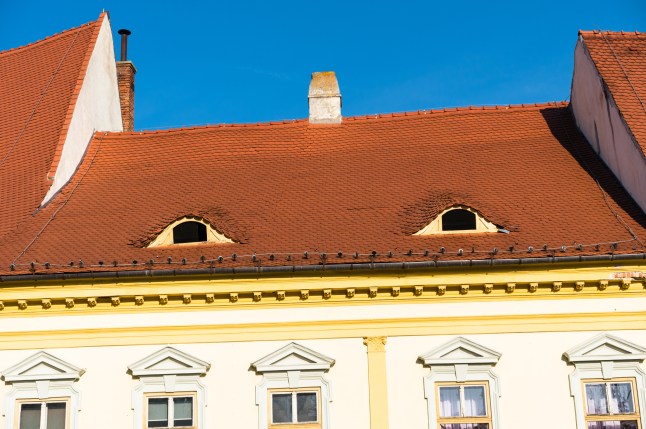 The iconic eye dormers or "Eyes of Sibiu" built into the rooftops of many buildings in Sibiu's old town.