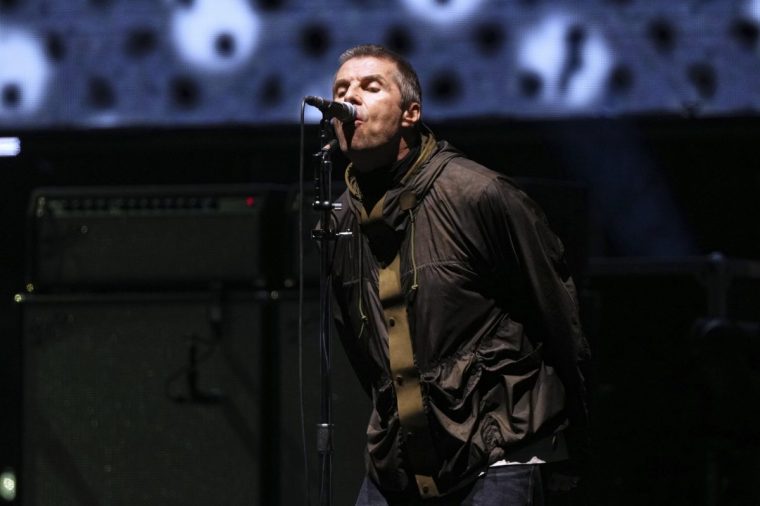 Liam Gallagher from the band Oasis performs during their reunion concert on Friday, July 4, 2025, in Cardiff. (Photo by Scott A Garfitt/Invision/AP)