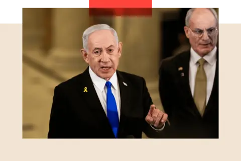 Getty Images Benjamin Netanyahu talking following a meeting with US House Speaker Mike Johnson