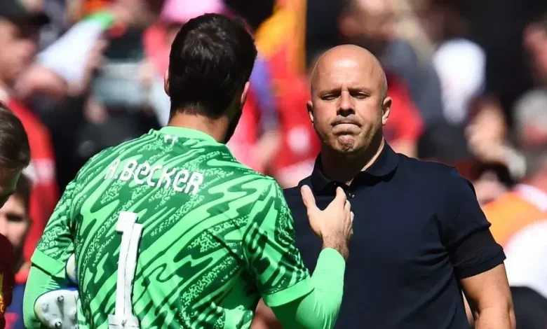 Alisson Becker and Arne Slot