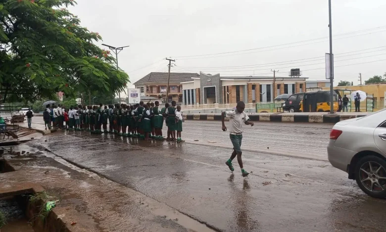 Benue kids under the rainBenue kids under the rain