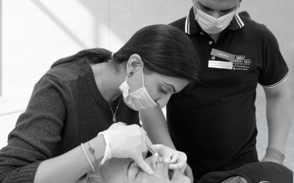 a woman getting a russian lips filler injection on a woman's face