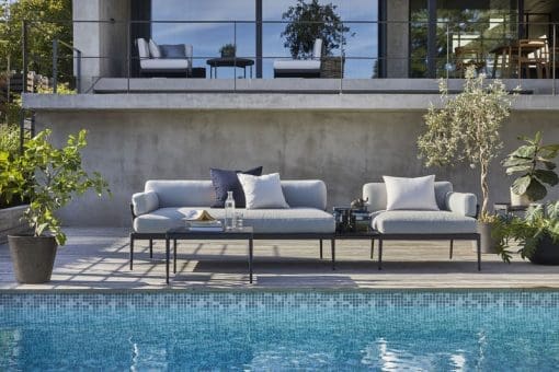 anholt outdoor sofa by they pool