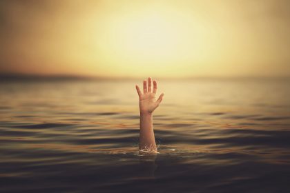 A hand coming out of the water