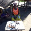 Woman entrepreneur with her products, Togo