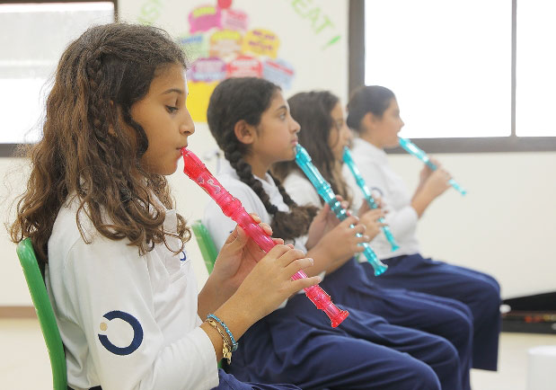 Students making music with instruments at Nün Academy International School