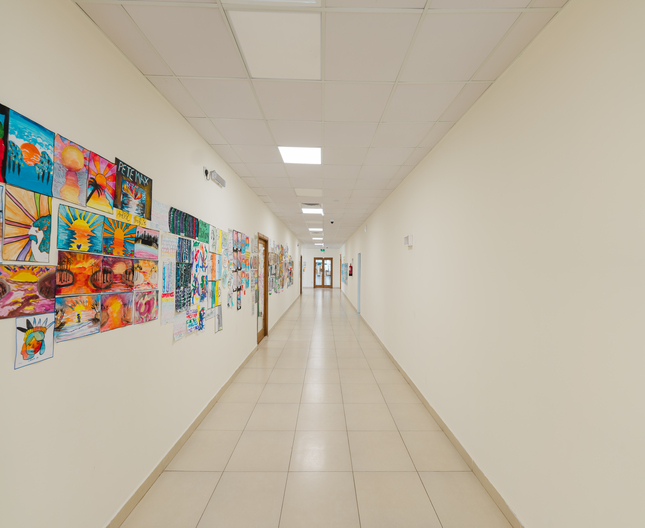 A colourful display of work completed by students in the corridors at Nün Academy International School