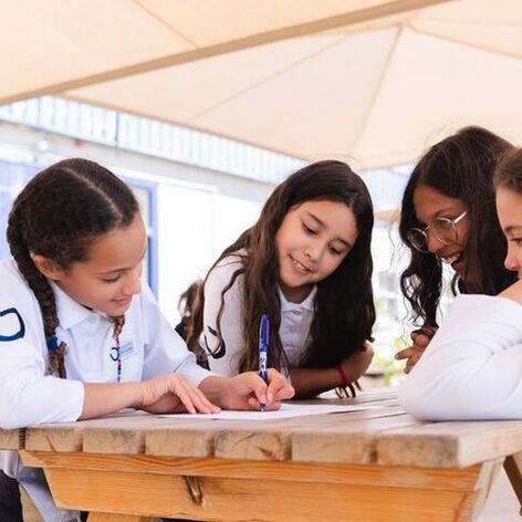 Students working together outdoors