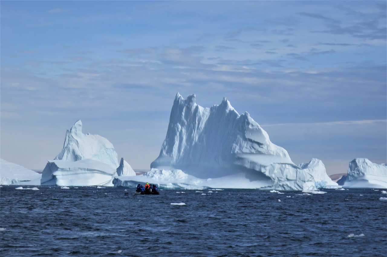 Iceberg Blue Sea Cold Greenland  - highflyer100 / Pixabay