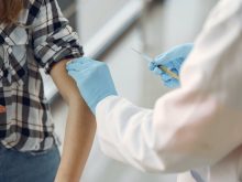 person getting vaccinated