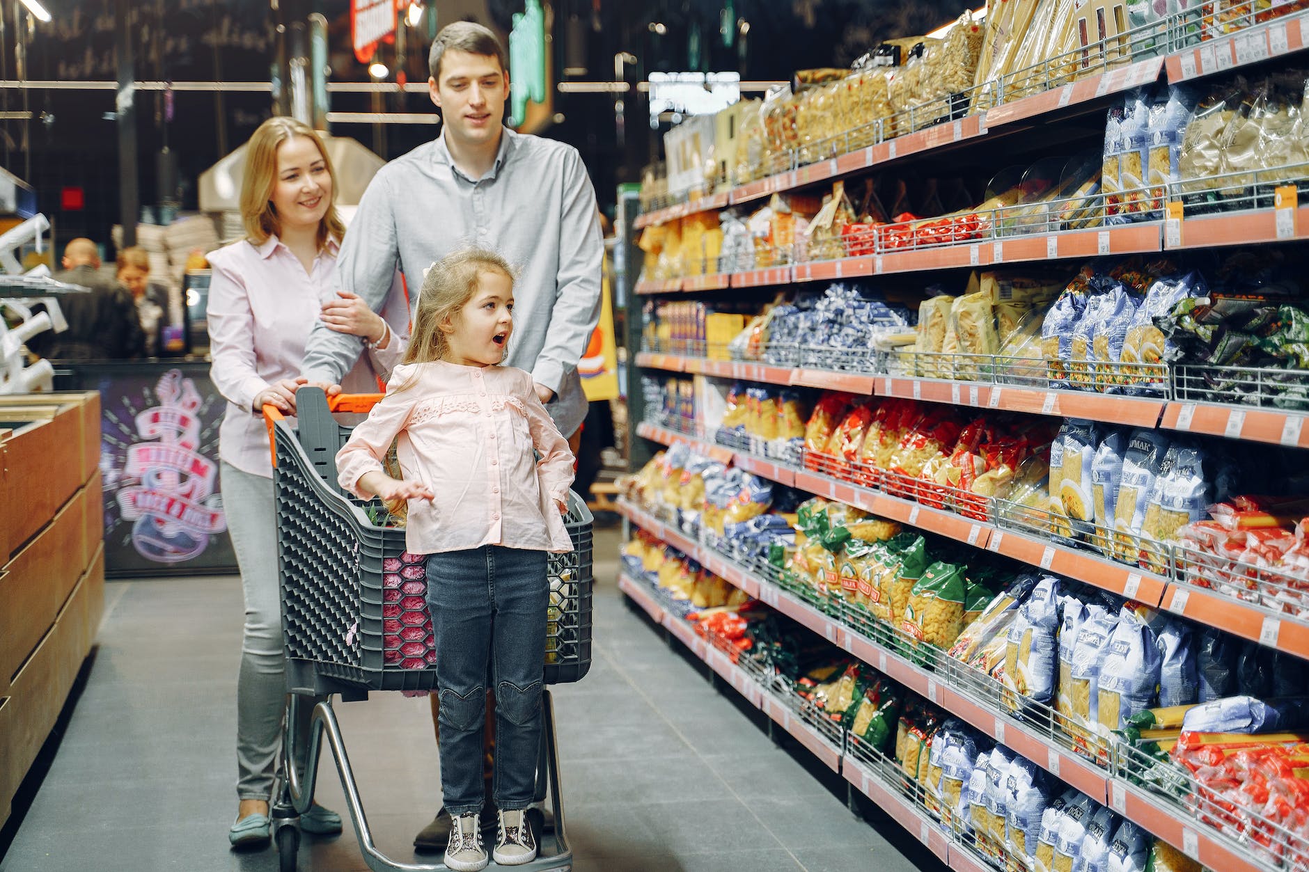 family doing shopping in the grocery store